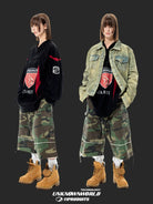 UNKNOWNWORLD Raw Edge Camo Cargo Shorts in Green - On Female Model