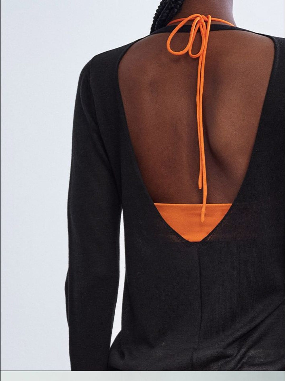 RARELY ALIKE Silk Wool V Neck Backless Cardigan in Black - On Model