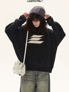 LOSTCTRL Cotton Blend Logo Knit Sweater in Black - On Female Model
