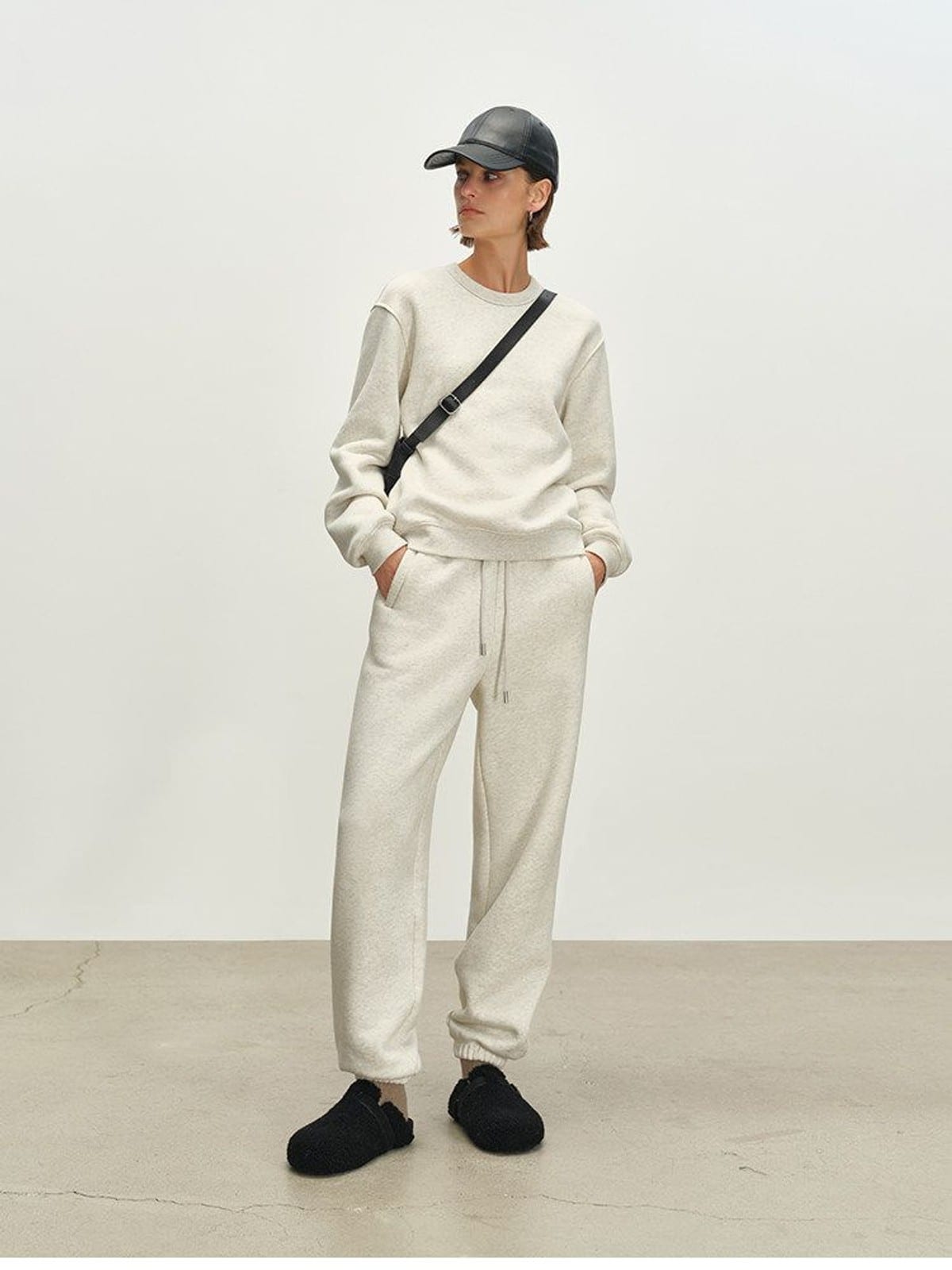 MSBEAST Fleece Lined Cotton Sweatshirt Pants Set in Beige - On Female Model