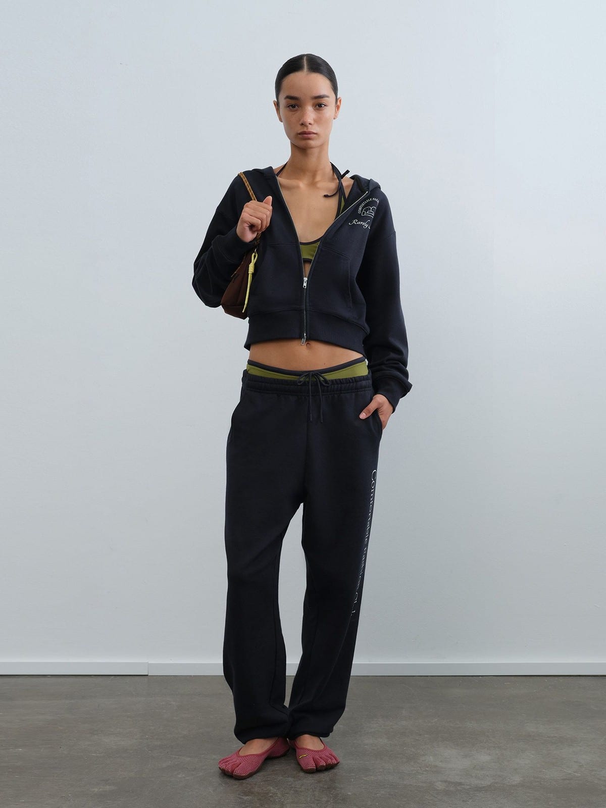 RARELY ALIKE Graphic Cropped Zip Up Hoodie in Navy Blue - On Female Model