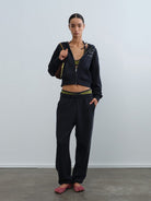 RARELY ALIKE Graphic Cropped Zip Up Hoodie in Navy Blue - On Female Model