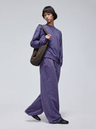 SIMPLE PROJECT Faded Cotton Crewneck Sweatshirt in Purple - On Male Model