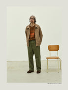 USAGE Heavyweight Herringbone Twill Belted Trousers in Olive - On Male Model