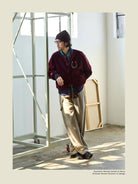 USAGE Reversible Velvet Leather Varsity Jacket in Navy Blue - On Male Model