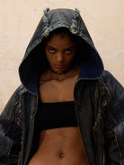 PERSONSOUL Distressed Hooded Denim Jacket in Denim - On Female Model