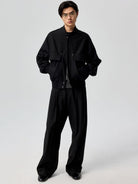 SIMPLE PROJECT Band Collar Worsted Wool Bomber Jacket in Black - On Male Model