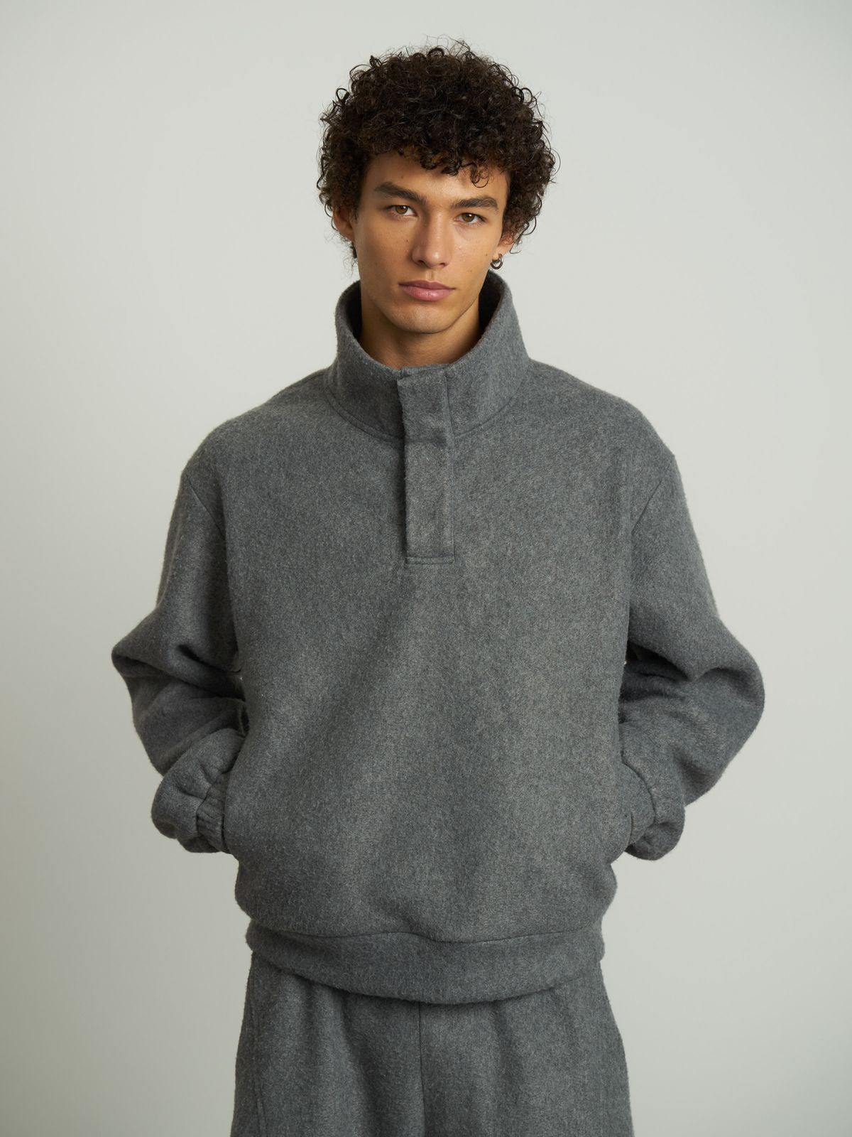 Retro 21 High Neck Fleece Sweatshirt in Gray - On Male Model