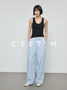 CEST M Striped Pima Cotton Shirt Pants Set in Sky Blue - On Female Model