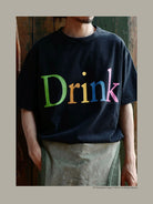 USAGE Faded Rainbow Logo T Shirt in Black - On Male Model