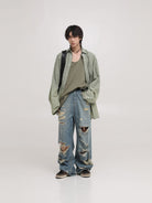 MASONPRINCE High Waisted Distressed Straight Leg Jeans in Blue - On Male Model