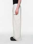 BLINDNOPLAN Metallic Logo Zip Hoodie Pants Set in White - On Model