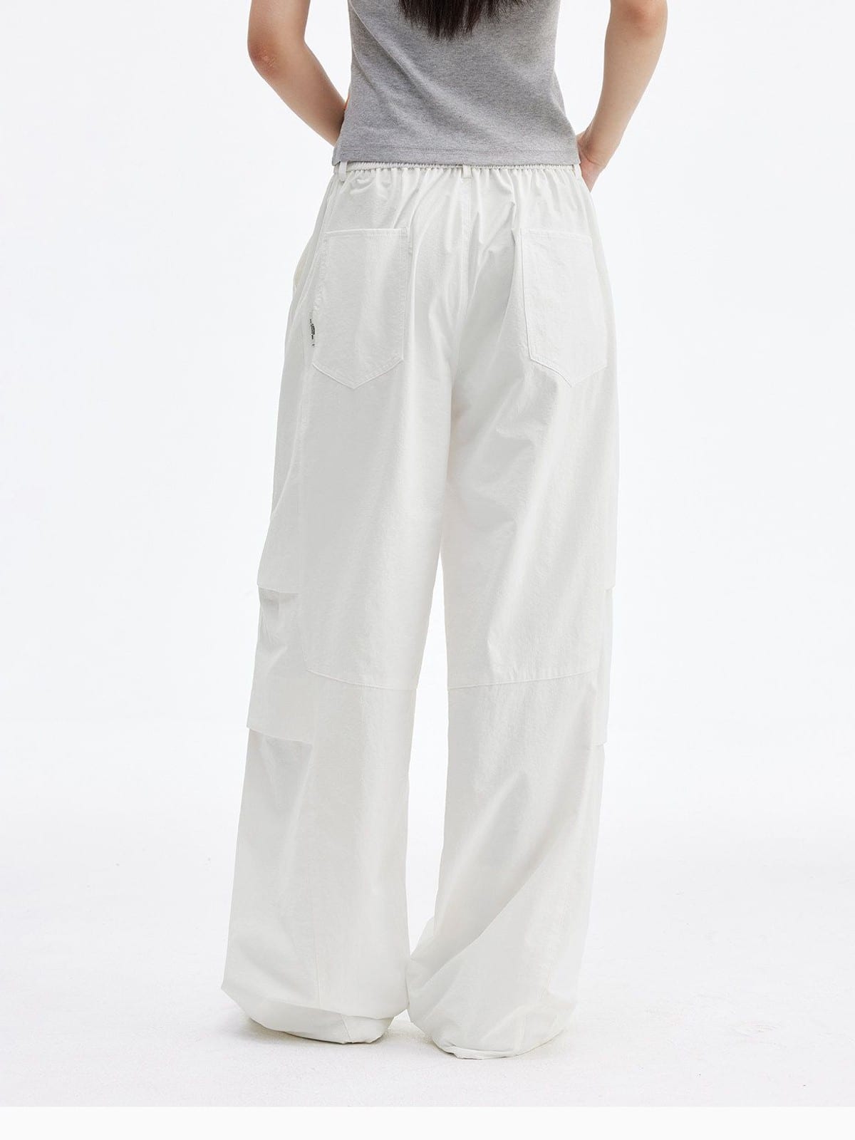 MEDM Crinkled Nylon Parachute Cargo Pants in White - On Model