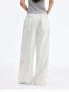 MEDM Crinkled Nylon Parachute Cargo Pants in White - On Model