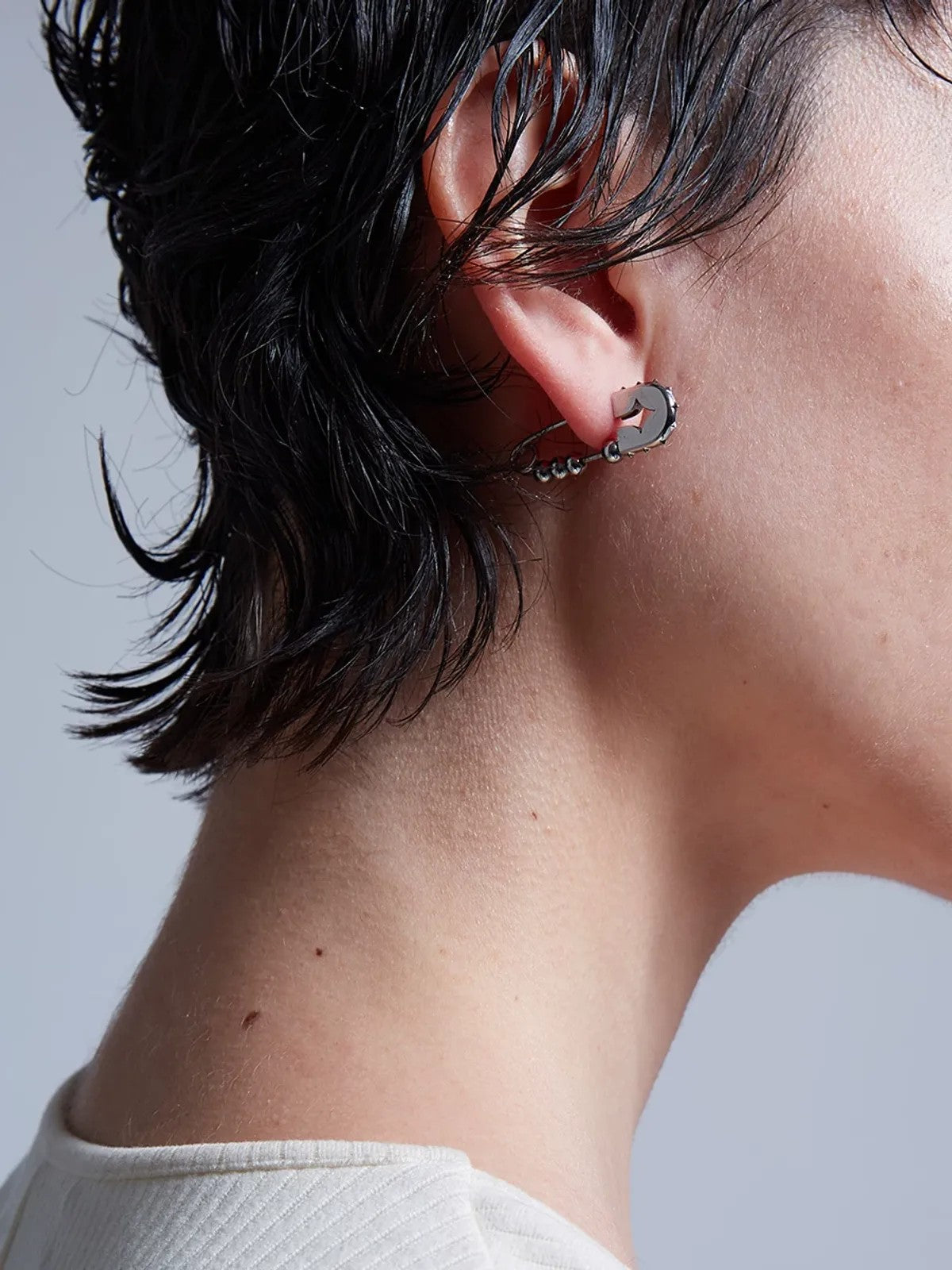 BLACKHEAD Rivet Ball Safety Pin Earrings in Silver - On Model