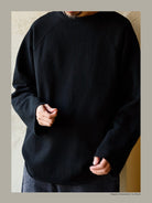 USAGE Slub Cotton Raglan Sweatshirt in Black - On Male Model