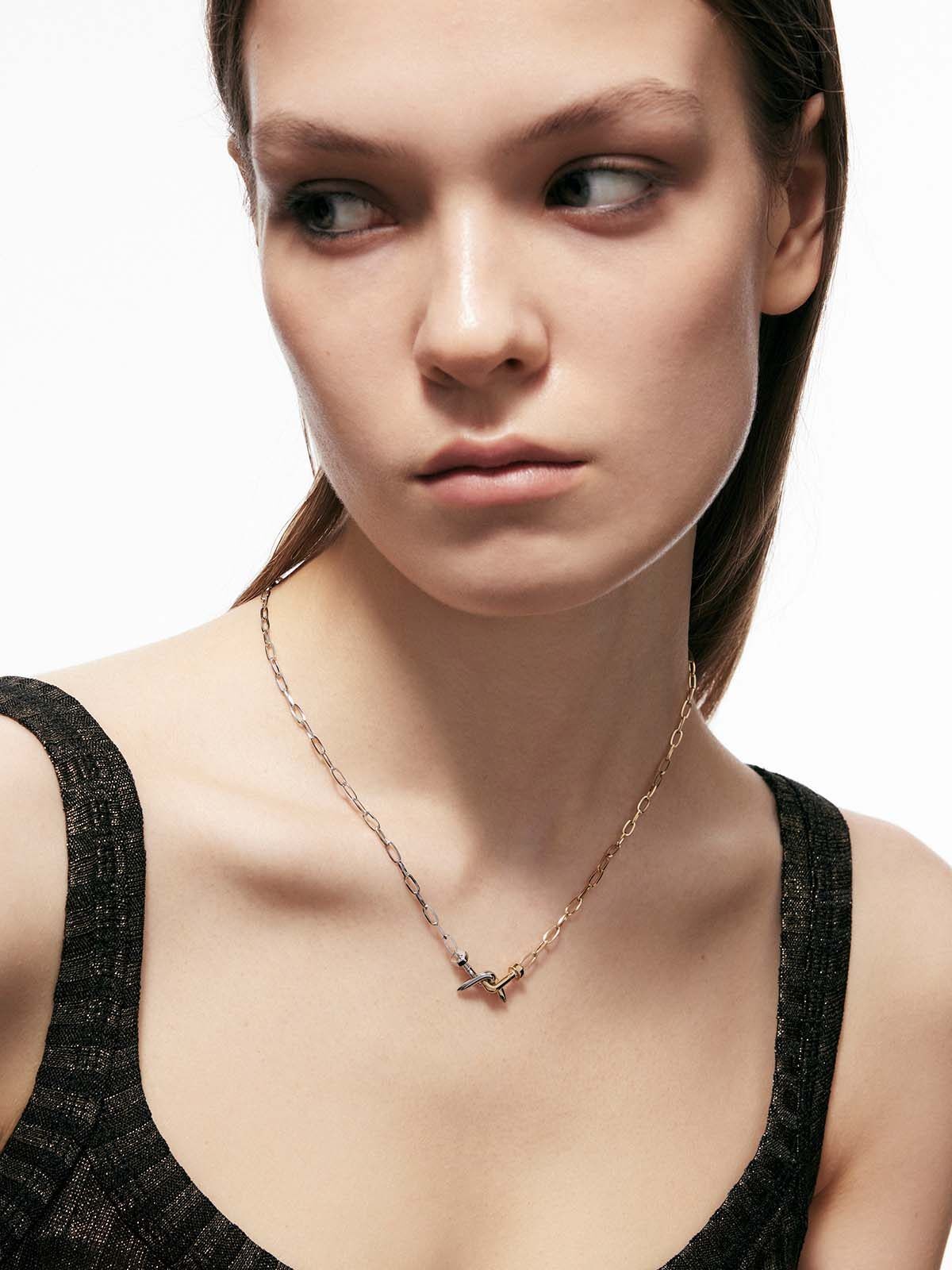 BLACKHEAD Two Tone Twisted Nail Steel Necklace in Gold - On Female Model