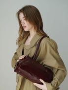 PANLULUPAN Oil Wax Leather Pillow Shoulder Bag in Beige - On Female Model