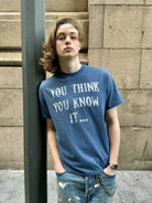 VLABMADE Distressed Slogan Boxy T Shirt in Blue - On Male Model