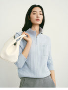 TEASEL Wool Cable Knit Zip Cardigan in Sky Blue - On Female Model