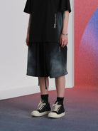 LOSTCTRL Spray Paint Drawstring Cotton Shorts in Black - On Model