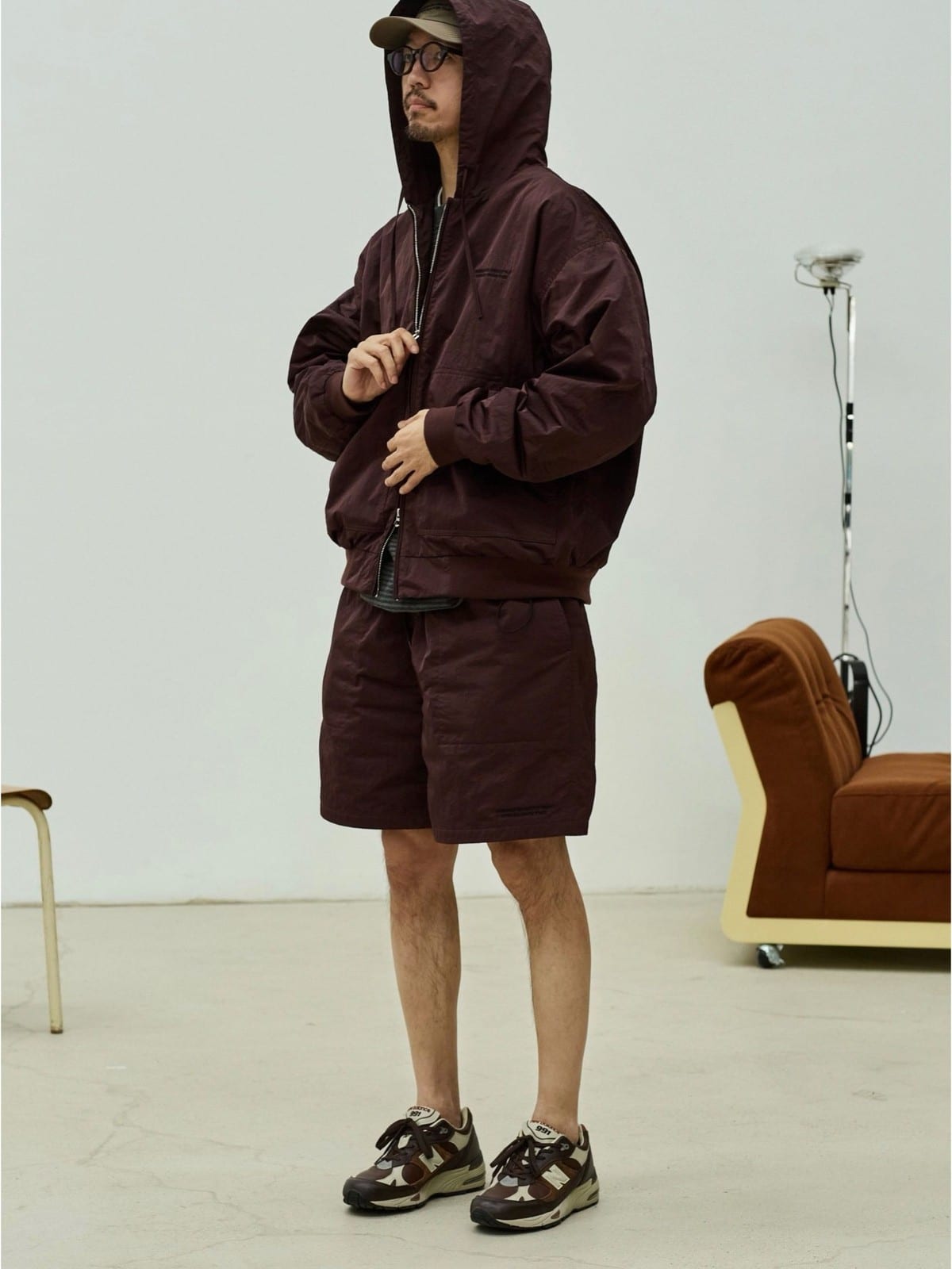 USAGE Crinkle Nylon Hooded Track Jacket in Brown - On Male Model