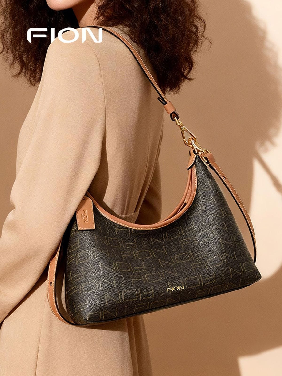 FION Monogram Crossbody Hobo Bag in Brown - On Female Model