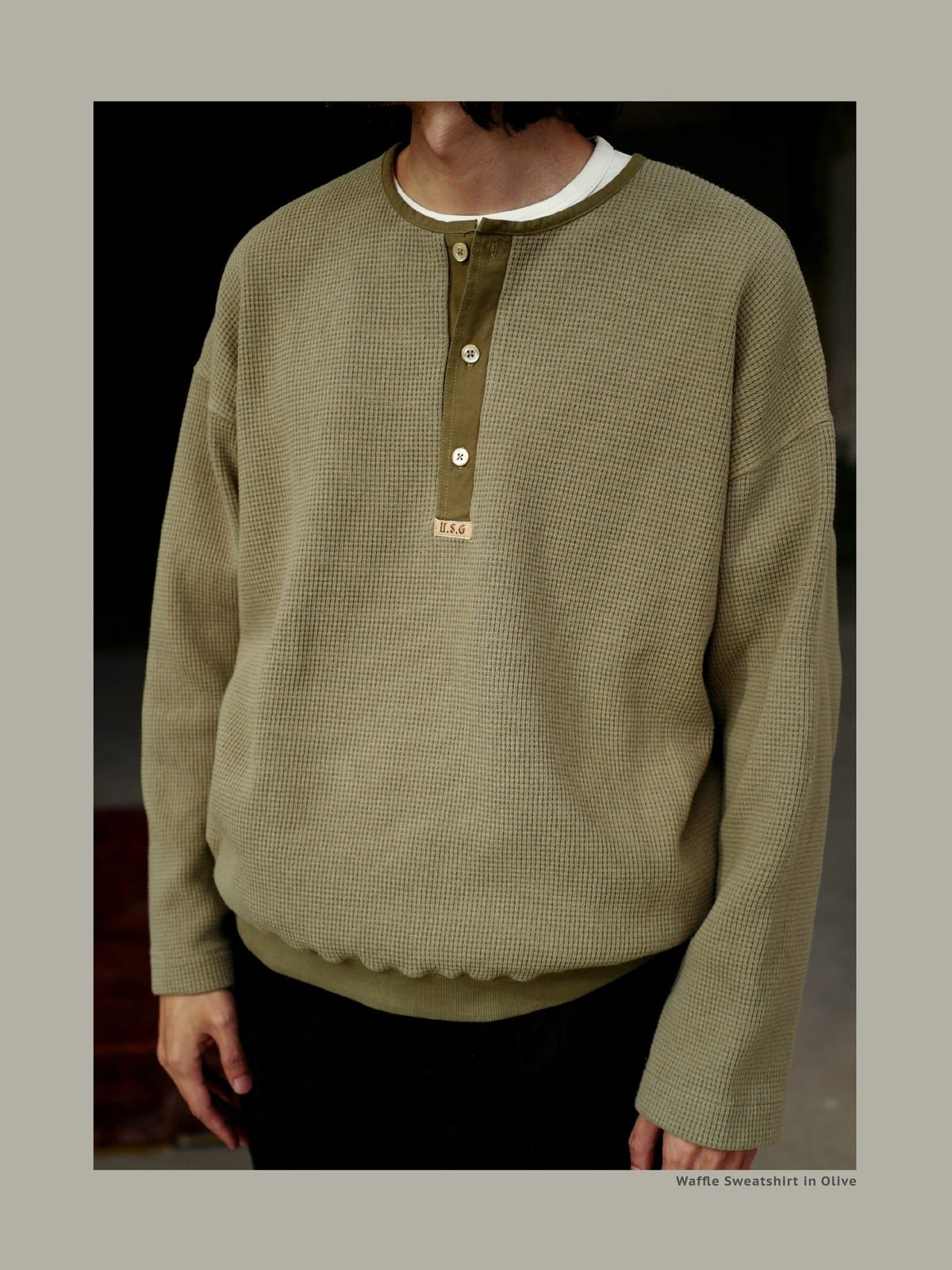 USAGE Heavyweight Waffle Knit Henley Sweatshirt in Olive - On Male Model