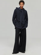 SIMPLE PROJECT Spacer Fabric Slit Hem Sweatshirt in Navy Blue - On Male Model