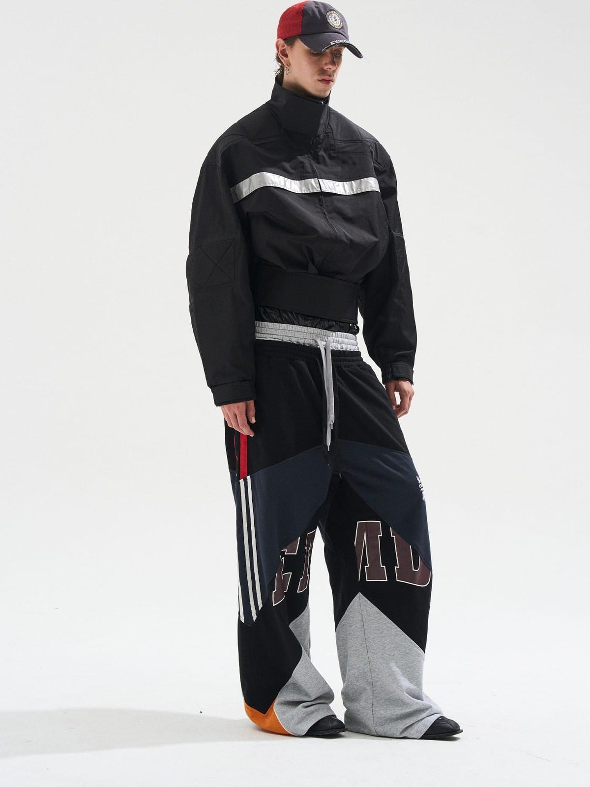 BLINDNOPLAN Reflective Strip Stand Collar Jacket in Black - On Male Model