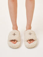 SMFK Cross Motif Faux Fur Platform Slides in White - On Model