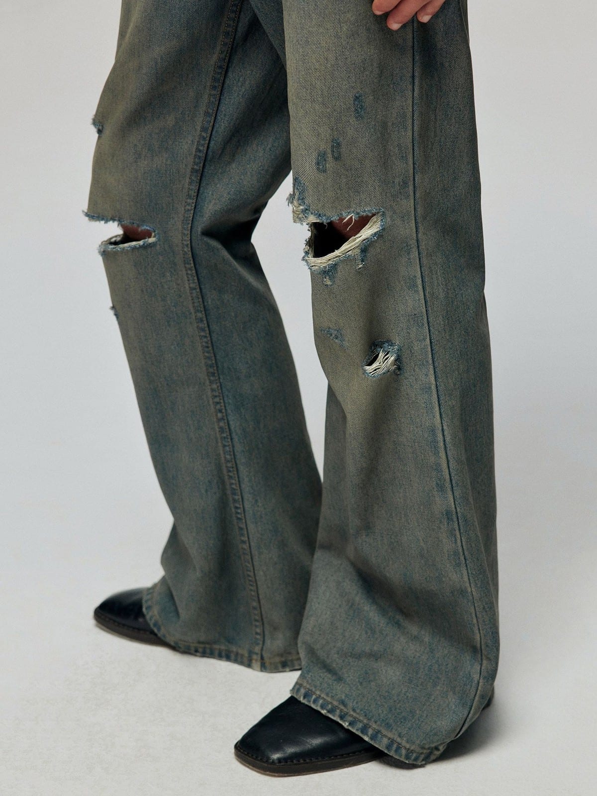 SIMPLE PROJECT Distressed Vintage Wash Flare Jeans in Blue - On Model