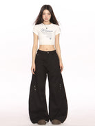 BIGGOLD STUDIO Deconstructed Curved Seam Trousers in Black - On Female Model