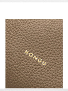 HONGU Leather Crossbody Pillow Bag in Beige - Detail