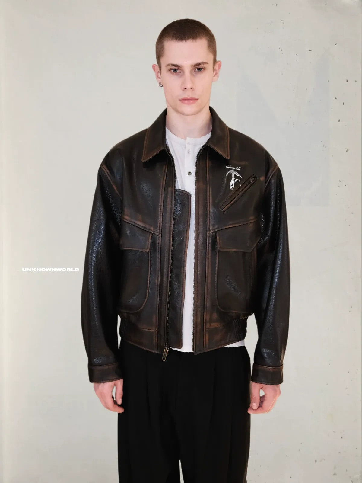 UNKNOWNWORLD Distressed Cowhide Flight Jacket in Brown - On Male Model