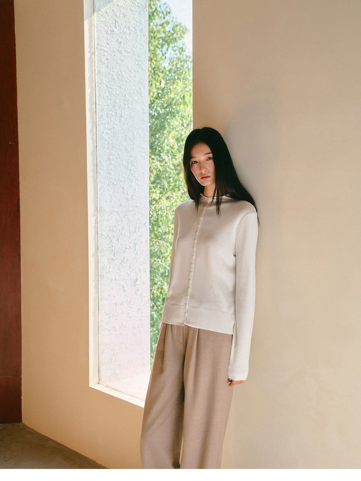 TEASEL Worsted Wool Mock Neck Cardigan in Cream - On Female Model