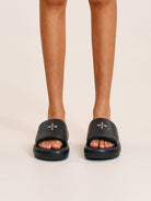 SMFK Cowhide Leather Cross Hardware Slides in Black - On Model