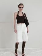 RARELY ALIKE Tailored Bermuda Shorts in White - On Female Model