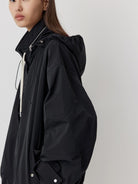 Random Piece Triacetate Blend Jacket With Stowable Hood in Black - On Female Model