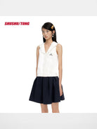 SHUSHUTONG Ruffled Double Collar Cotton Shirt in White - On Female Model
