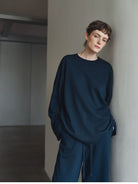MSBEAST Cotton Terry Sweatshirt Tapered Joggers in Navy Blue - On Female Model