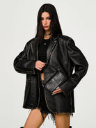 SMFK Cross Badge Leather Shoulder Bag in Black - On Female Model