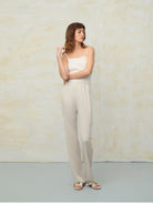 TEASEL Cooling Wide Leg Trousers in Cream - On Female Model