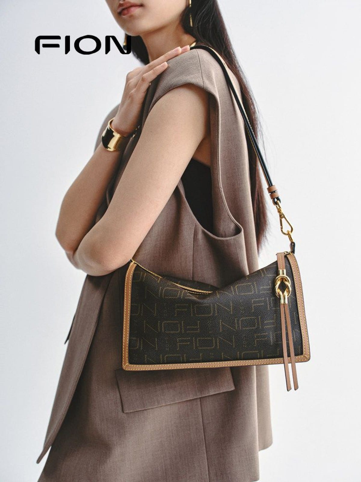 FION Monogram Coated Canvas Shoulder Bag in Dark Brown - On Female Model