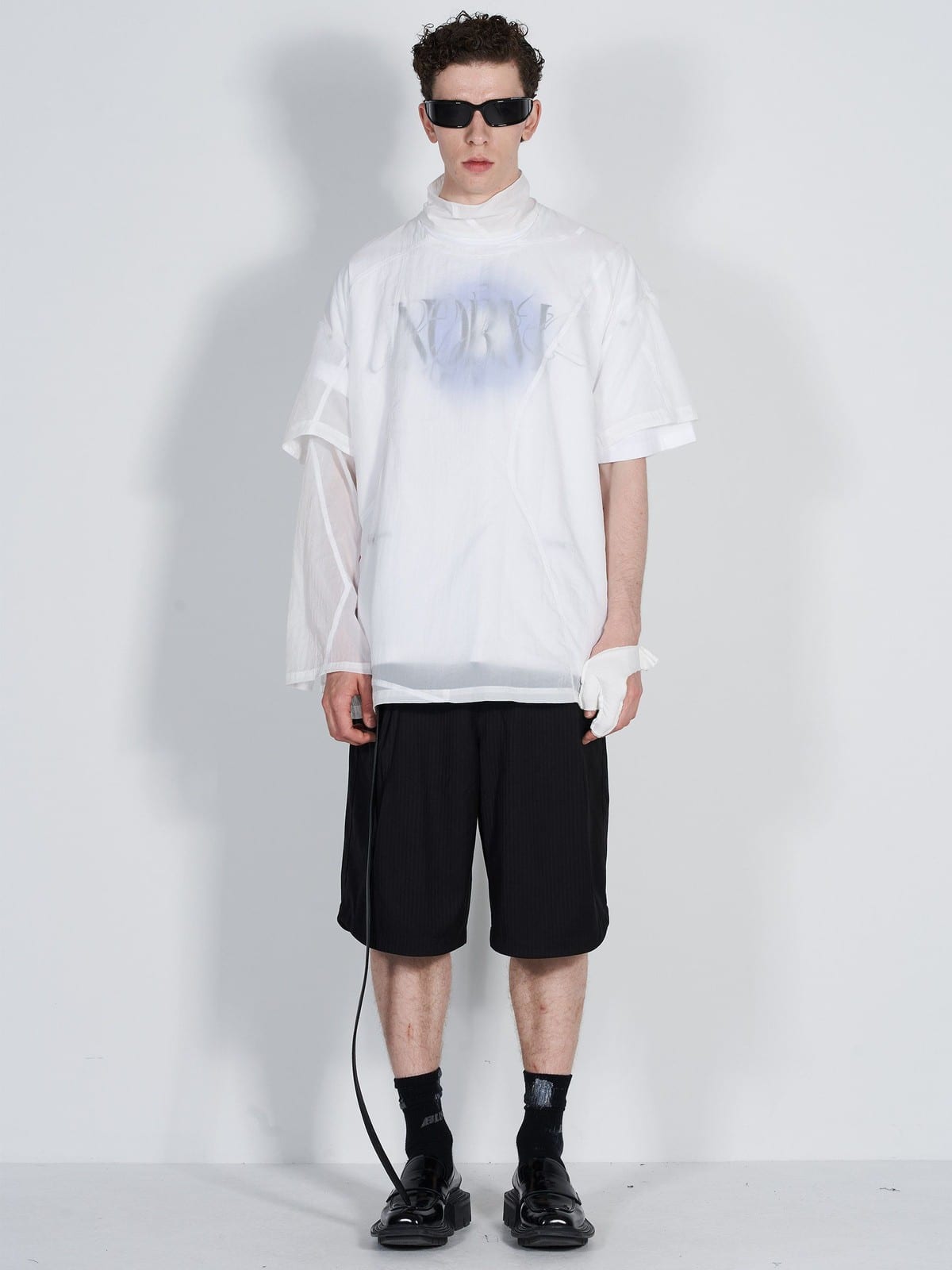 BLINDNOPLAN Asymmetric Striped Suit Shorts in Black - On Male Model