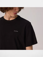 AFterTaste Small Crew Neck T Shirt in Black - On Male Model