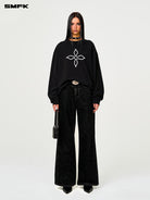 SMFK Oversized Cross Print Cotton Sweatshirt in Black - On Female Model