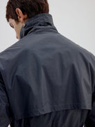 SIMPLE PROJECT Coated Drawstring Hunting Jacket in Gray - On Male Model