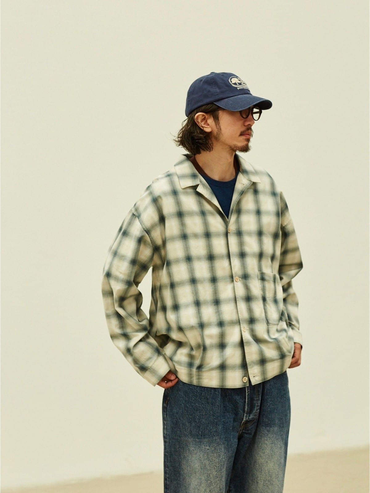 USAGE Gradient Plaid Cotton Blouson in Off-White - On Male Model
