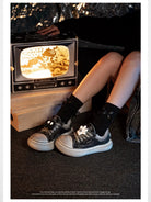 OLDORDER Mickey Mouse Chunky Platform Sneakers in Black - On Female Model